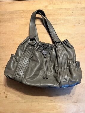 Michael Kors Jet Set Grey Leather Drawstring Shoulder Bag with MK Medallion